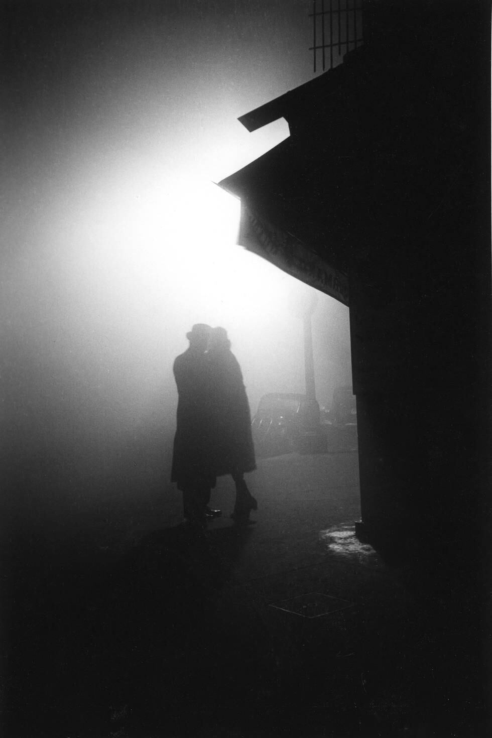 At night, a couple embrace in the darkness of a foggy street corner, Paris, France, 1934. (Photo by Fred Stein Archive/Archive Photos/Getty Images)