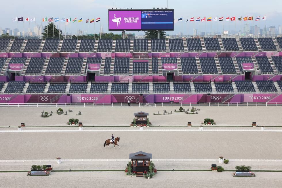 TOKYO, JAPAN - JULY 28: Brittany Fraser-Beaulieu of Team Canada riding All In competes in the Dressage Individual Grand Prix Freestyle Final in front of empty stands on day five of the Tokyo 2020 Olympic Games at Equestrian Park on July 28, 2021 in Tokyo, Japan.